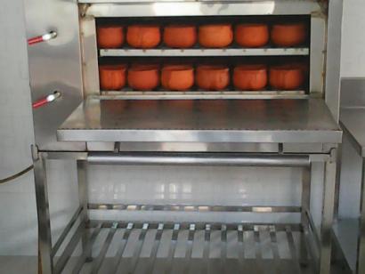 TỦ NẤU CƠM NIÊU